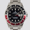 Men's Rolex. GMT II. Black Dial. Black and Red Bezel